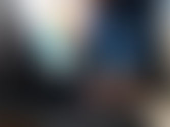 Hands typing on a laptop, surrounded by icons like 24/7 support, phone, and graphs. Blue-toned background, conveying technology focus.