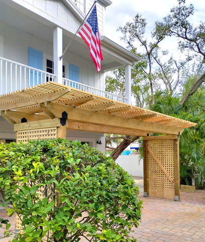 Garage Portico installation. Handyman and Remodeling Services to Sarasota County for 30 years! KM Professional Installations focus is Customer Service and Qualtiy Workmanship, every job no matter small or large. Locally owned and operated! 