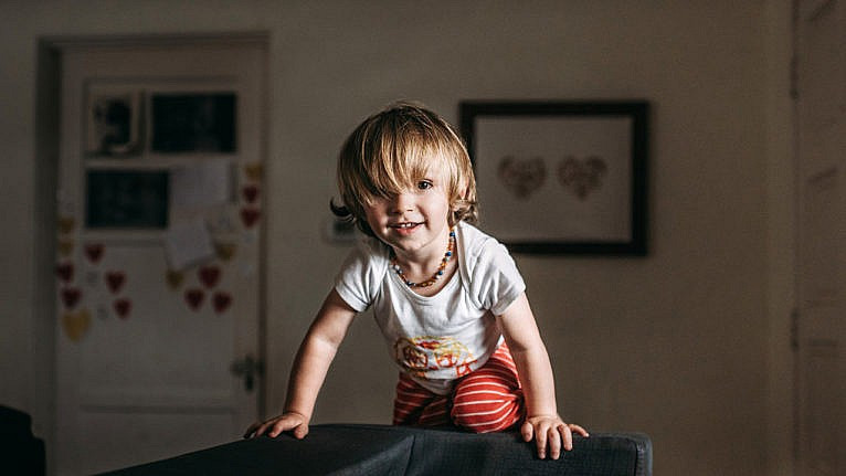 Why is my toddler climbing on everything