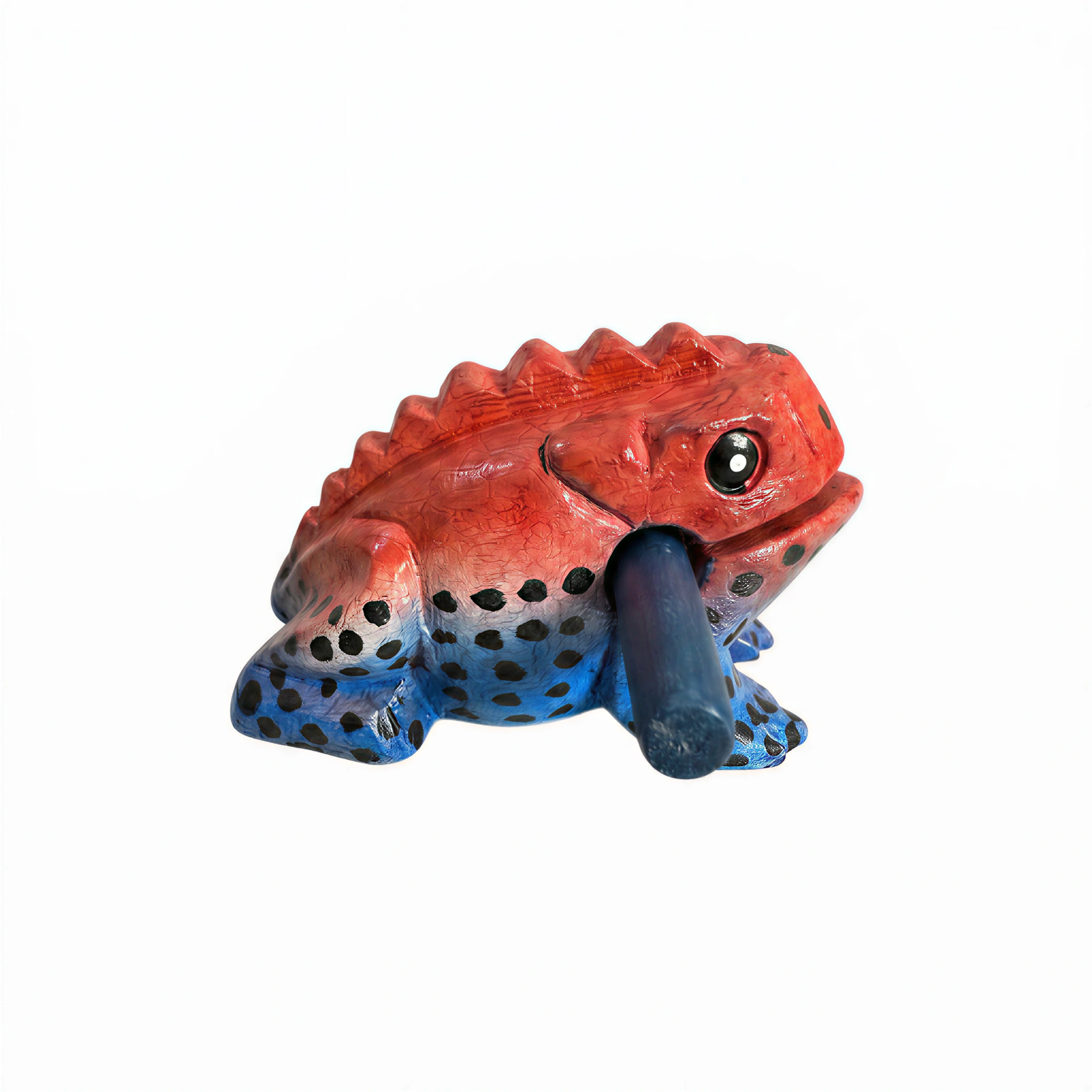 Small red and blue wooden musical frog with a playing stick