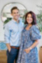 Alan and Elizabeth Young, owners of Sax and Blue, posing in their store