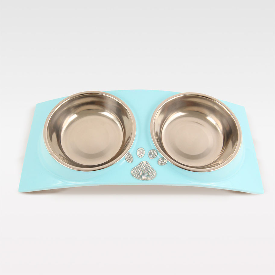 Doppel Fressnapf mit Strassstein Pfotenabdruck in hellblau, aus Kunststoff mit zwei Silbertellern für Futter und Wasser.