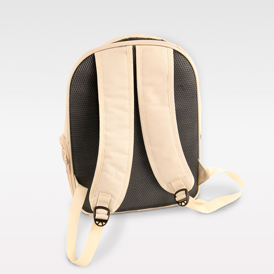 Rückansicht des eleganten cremefarbenen SNUGY Rucksacks für kleine Hunde mit ergonomischen Trägern.