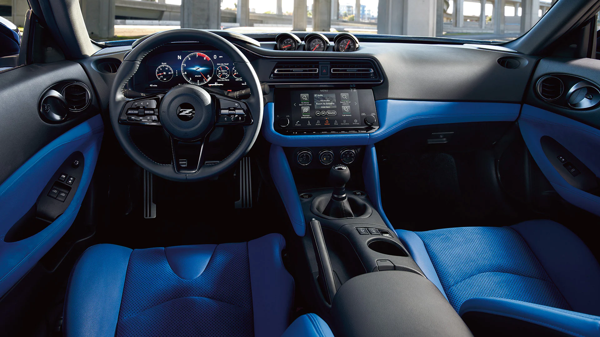 2023-nissan-z-driver-oriented-cockpit-in-blue-l.jpg.webp