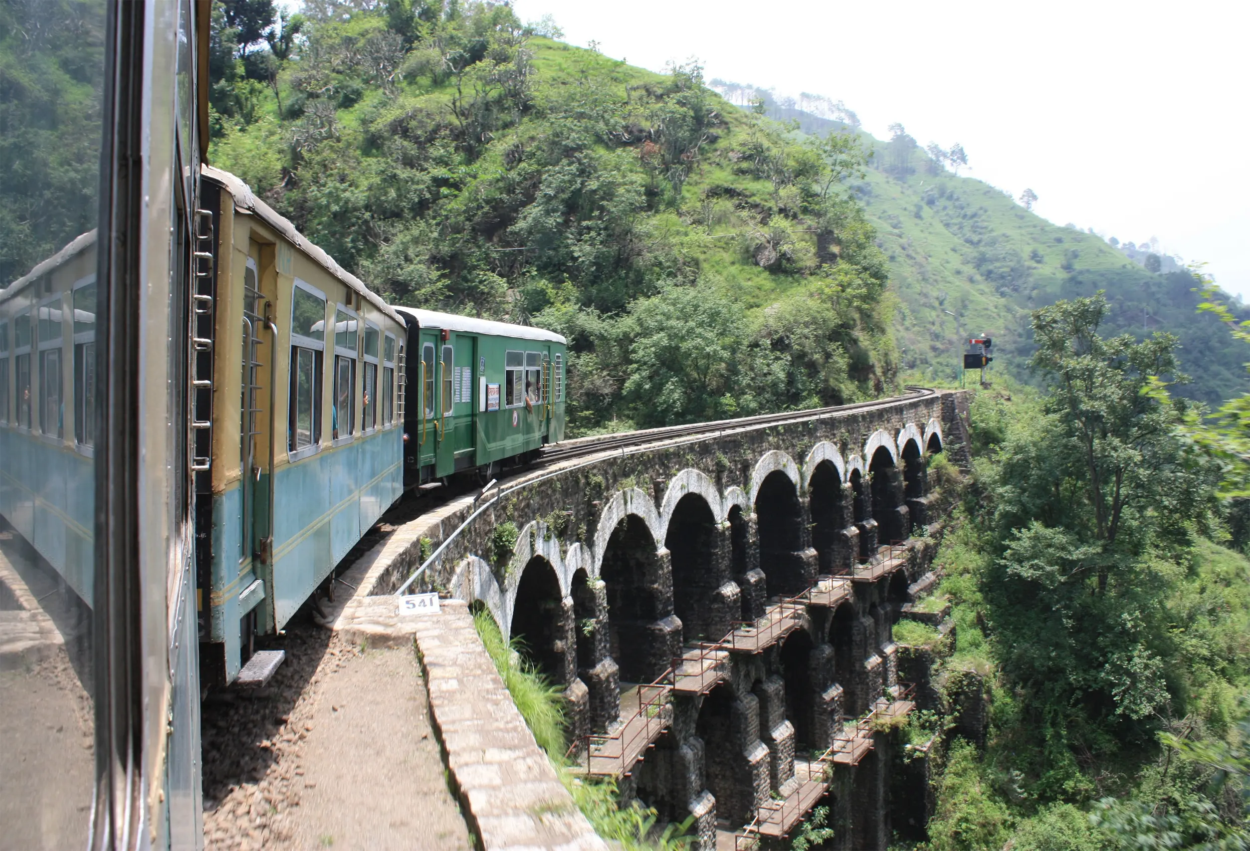 A train Going over the bridge made over valley
