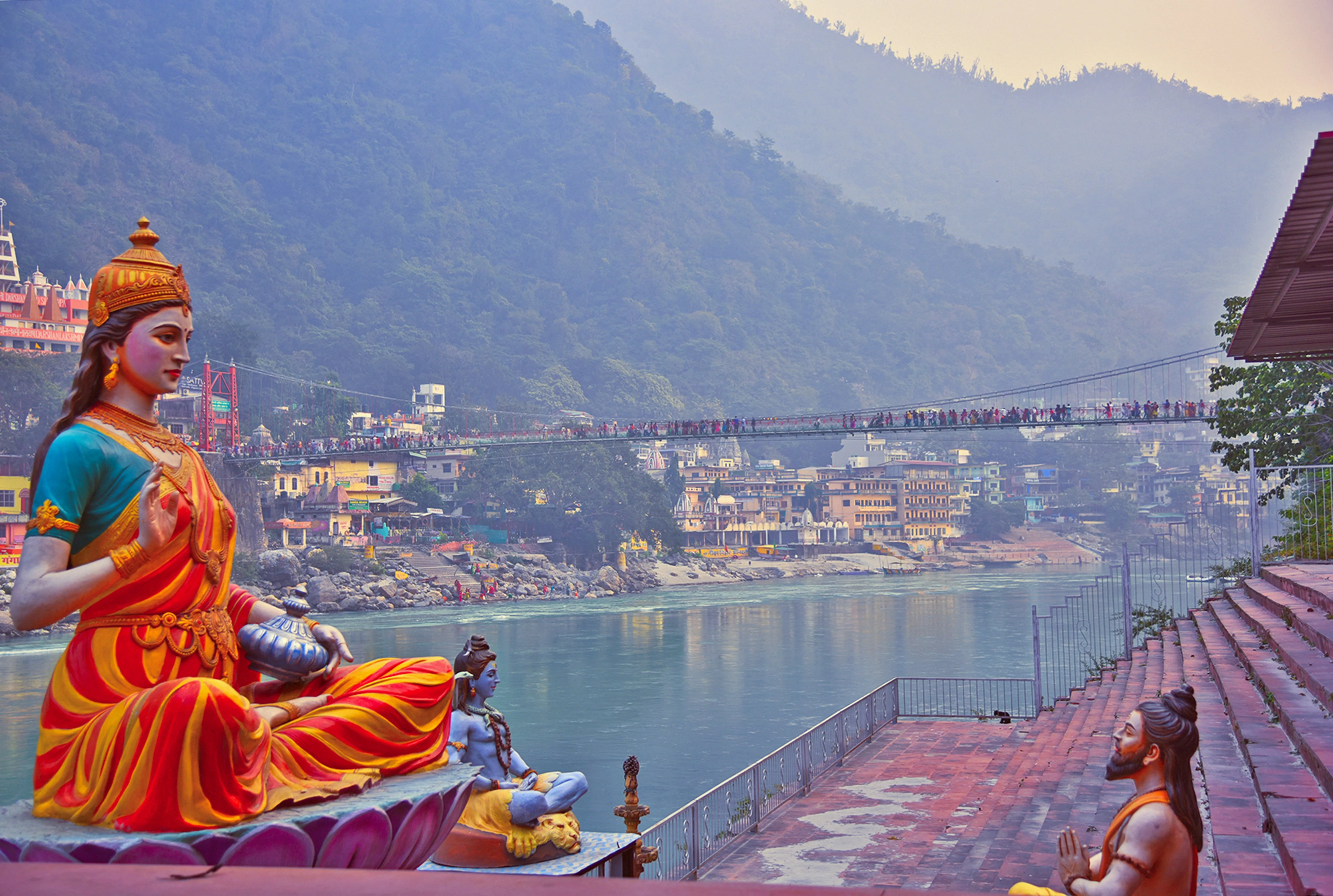 godess parvati statue on the bank of ganges with lord shiva statue 