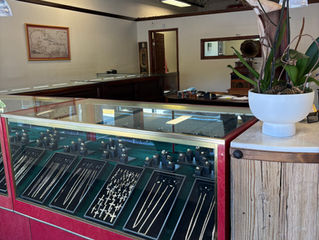 Inside Salerno Pawn Jewelry, a local jewelry store in Stuart, Florida, with gold chains, diamond rings, crosses, religious jewelry, and estate jewelry displayed for customers to shop, buy, sell, and browse in person.