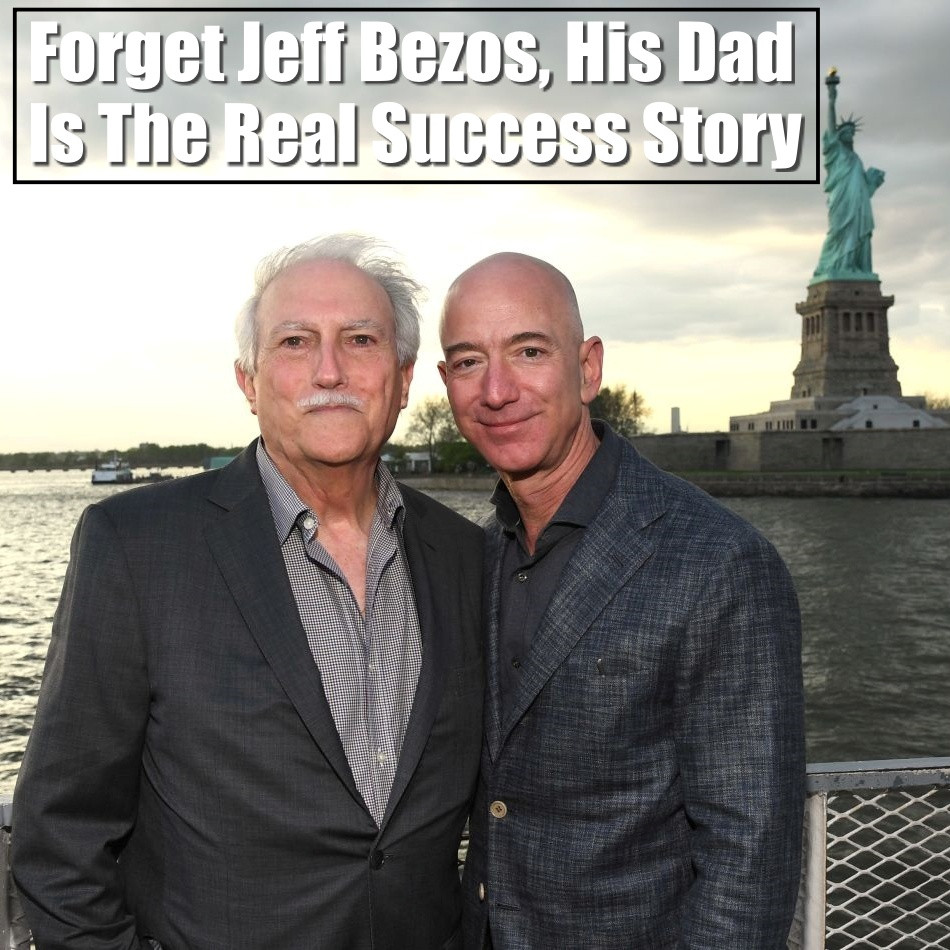 Jeff Bezos and Mike Bezos in front of Statue of Liberty