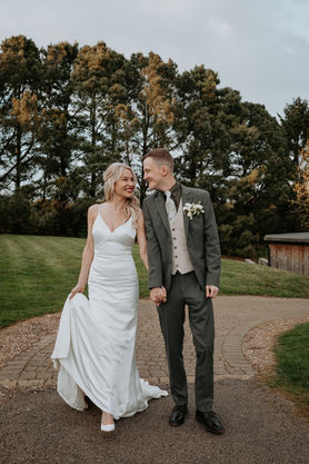 Newly Weds walking along a lane