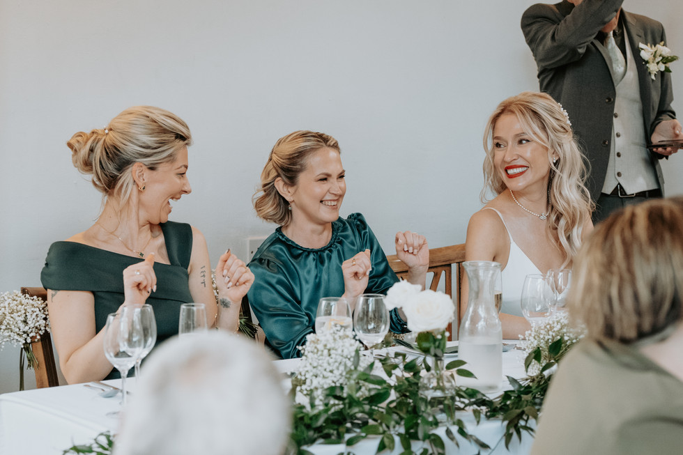 Bridesmaids laughing