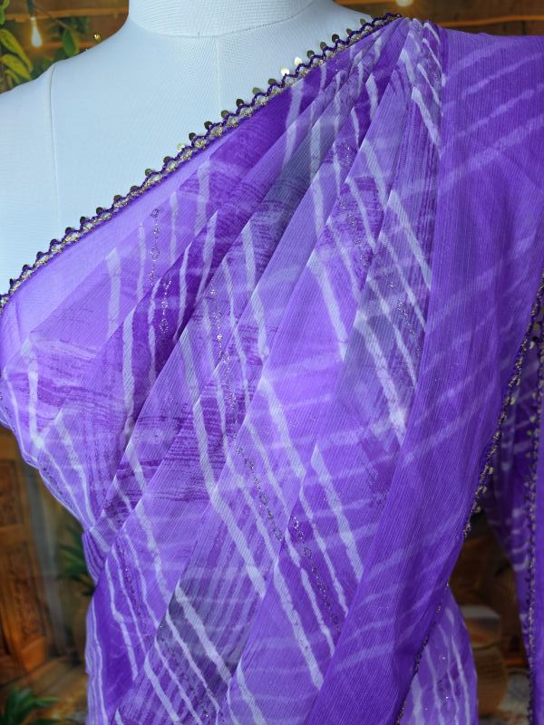 Violet chiffon lehariya saree with white diagonal stripes