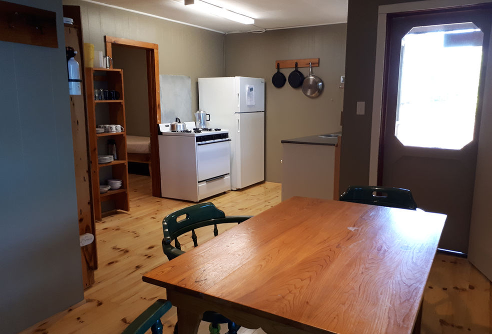 A side view of Pickerel Queen's kitchen and door.