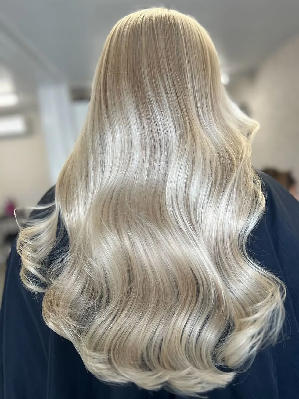 Arctic Pearl Blonde Balayage Hair Color with Cool Pearl Highlights
