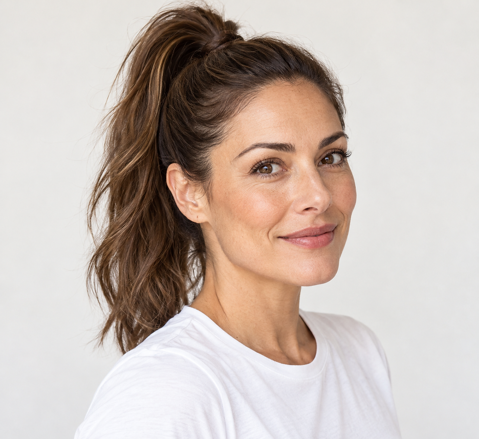 Woman with a high ponytail smiling