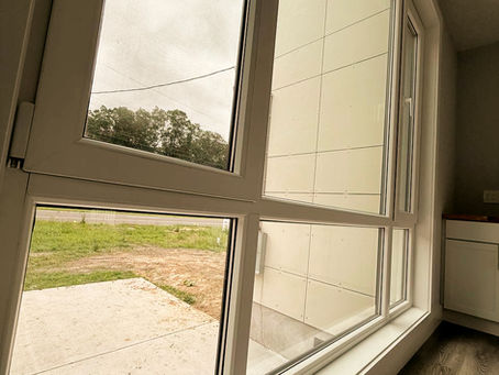 Interior view of dual casement windows with natural light