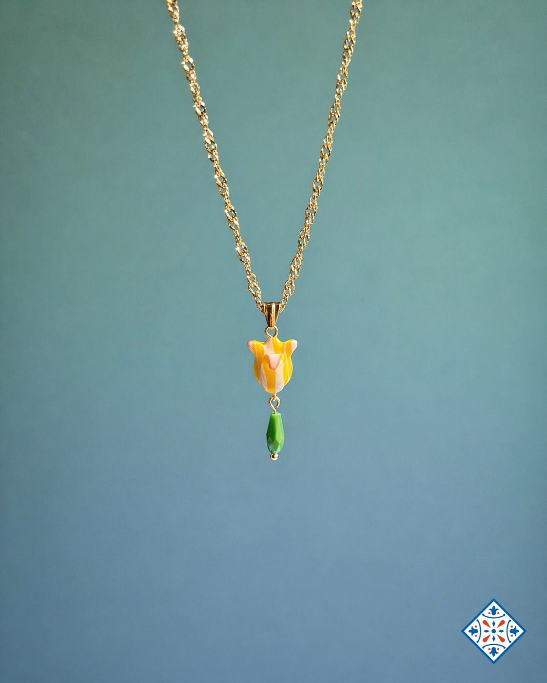 Collana con tulipano giallo striato e perlina verde