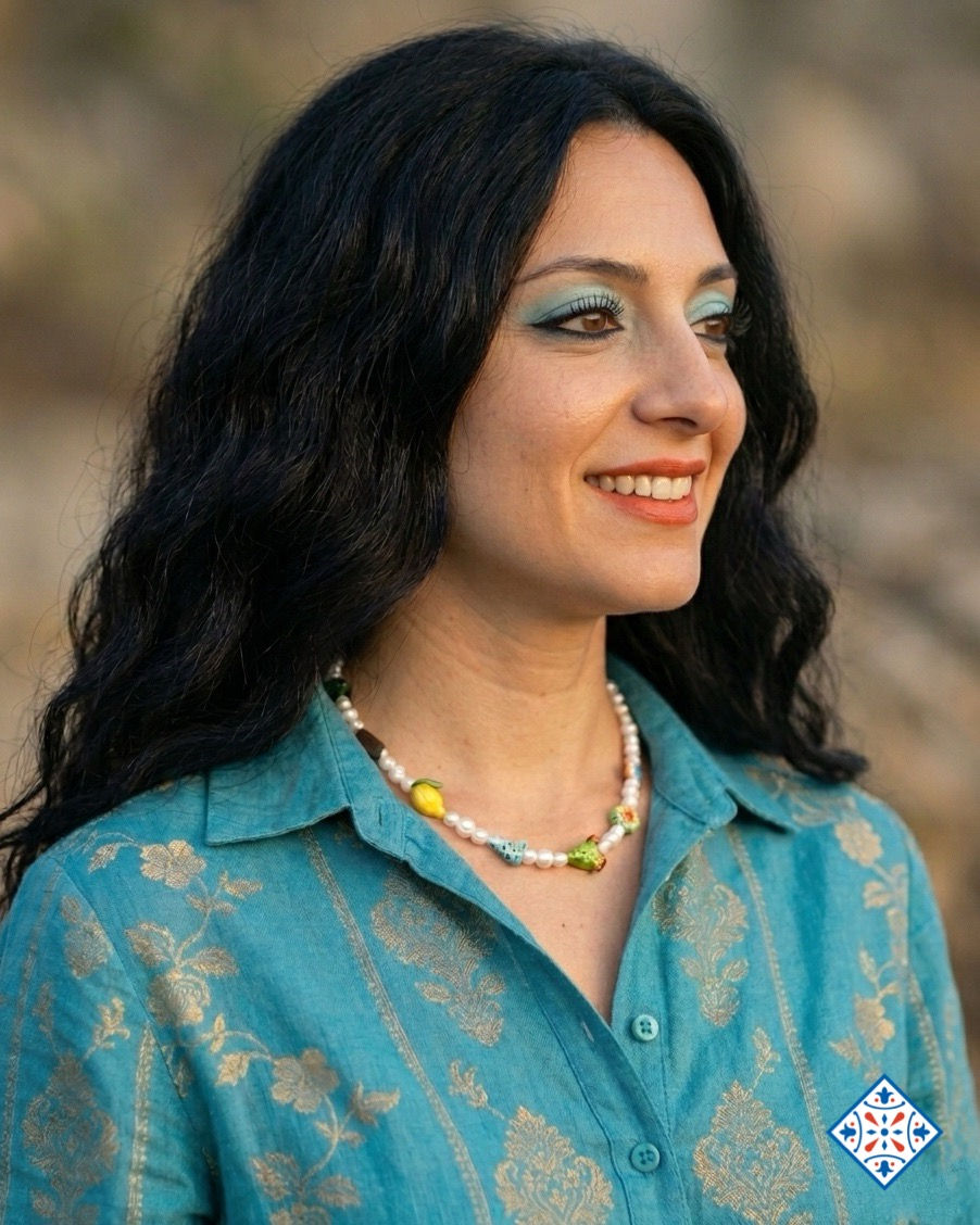 Miniatura: Collana di perle e simboli siciliani