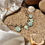 Thumbnail: Collana in cristallo di rocca e conchiglie iridescenti