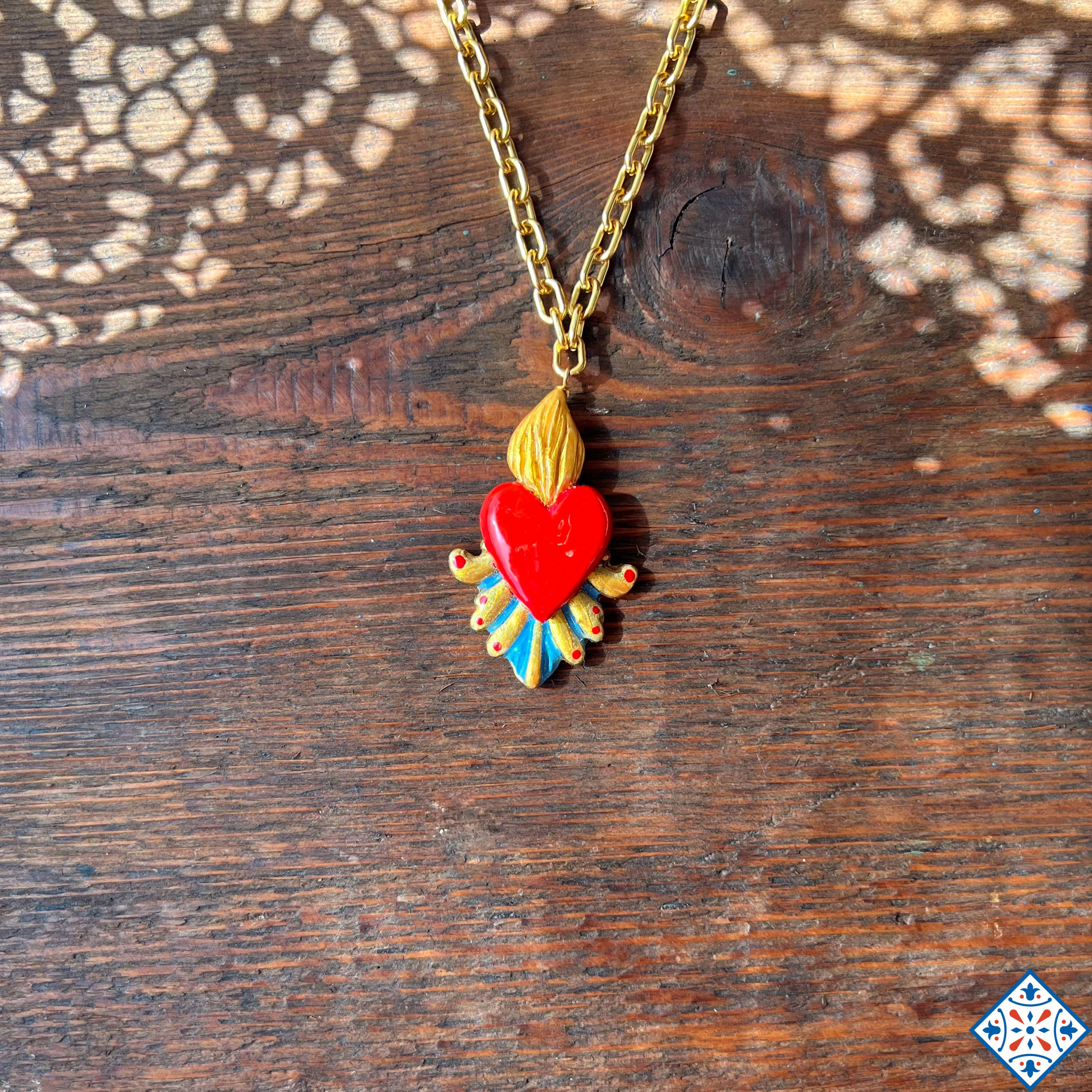 Collana catena spessa e cuore sacro