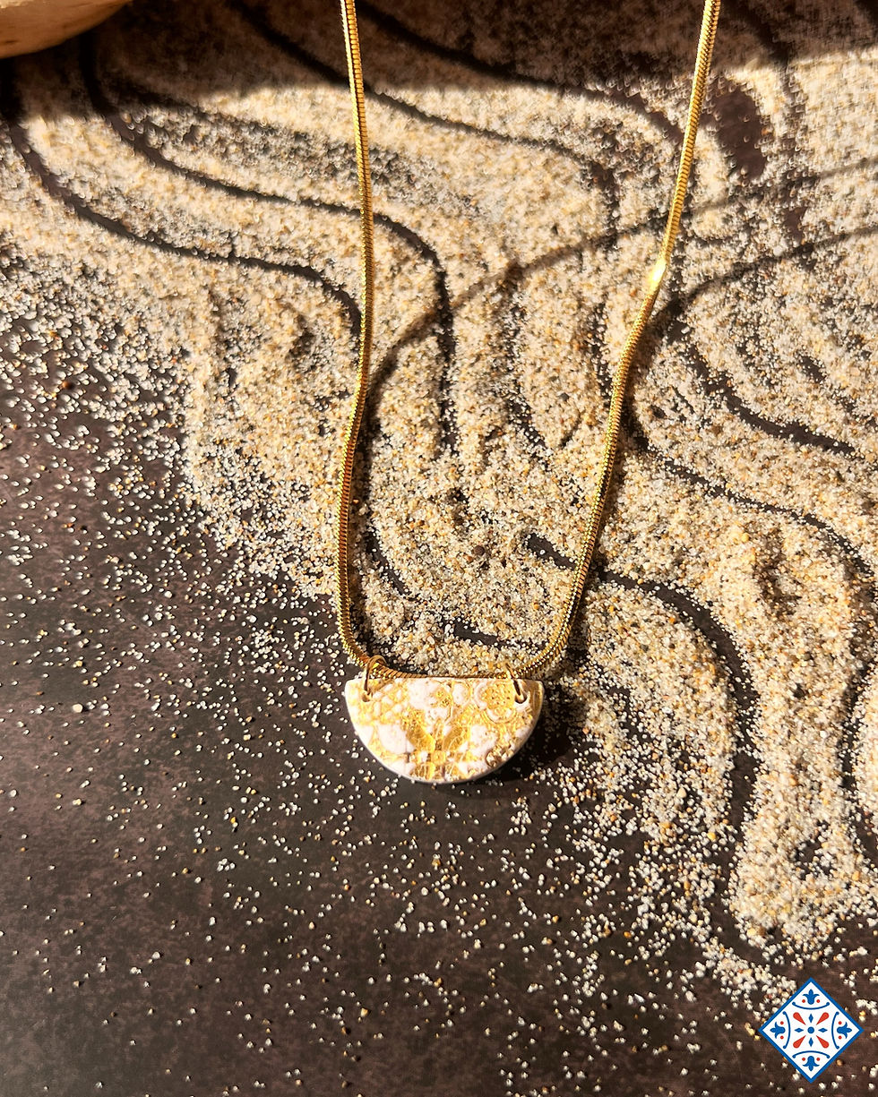 Collana bagliori dorati mezzeluna oro