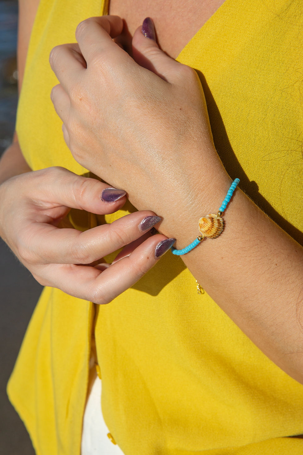 Thumbnail: Bracciale di perline con conchiglia