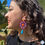 Thumbnail: Parure con ruote di carretto siciliano rosse e gocce di ceramica