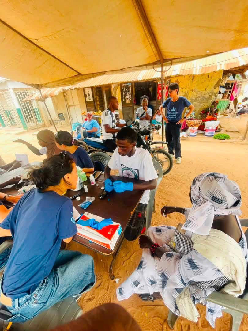 Health workers and volunteers conduct free diabetes and hypertension screening at the Gunjur Main Market. | Photos: Courtesy of the organisers