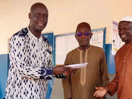 Orbit Travels boost Gunjur mortuary construction efforts with a D20,000 cash donation