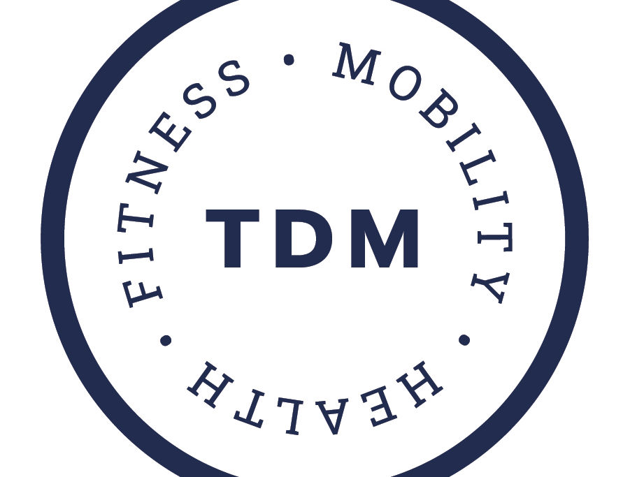 TDM Logo_Badge Tag 1 Color.jpg