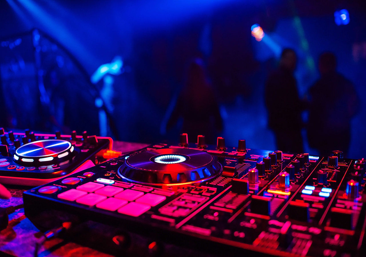 dj-console-for-mixing-music-with-blurry-people-dan-2023-11-27-05-33-41-utc (1)-min (1).jpg