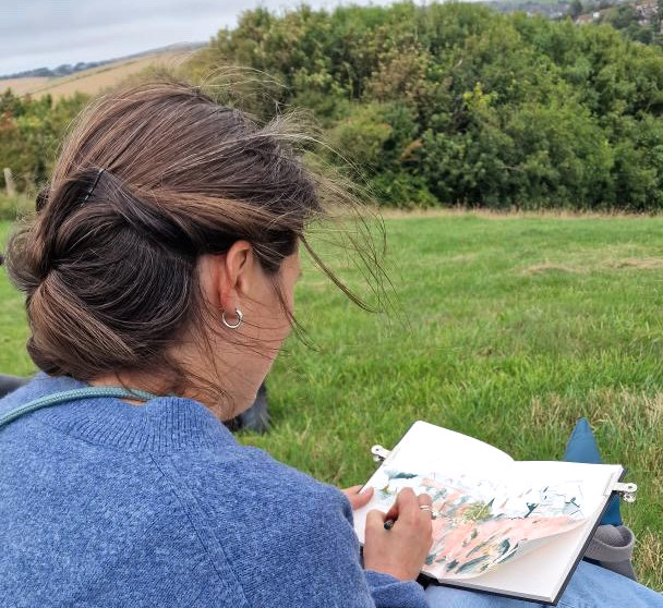 Children's book Illustrator Ulrike Mieke drawing on location, Brighton and Hove.
