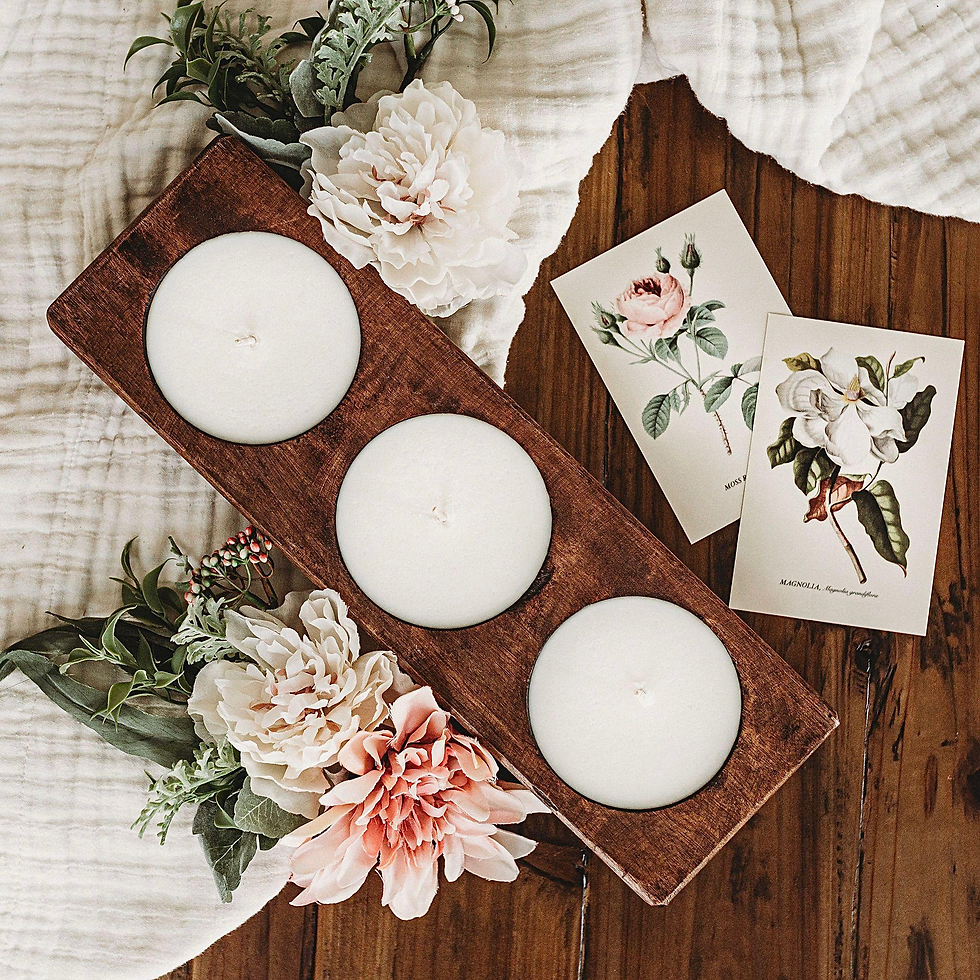 rustic centerpiece with 3 candles with flower