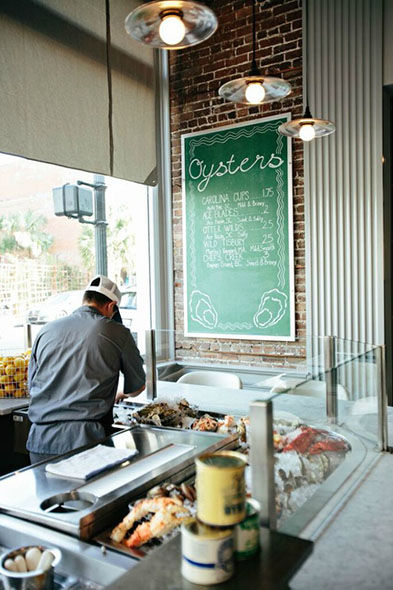 Chef cooking downtown charleston at the oyster bar