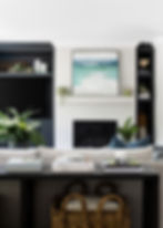 Feature fireplace and custom shelving by rae adam design studio