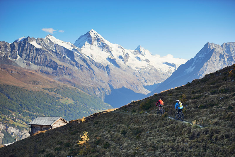 bicyclist, mountain bik, snow capped peaks