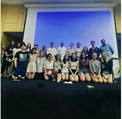 The UTokyo team along with the other red semifinalists: Belarusian State University, New York University, National University of Singapore, National University of Study and Research in Law Ranchi and Maastricht University. (Jean-Pictet Organizing Committee)
