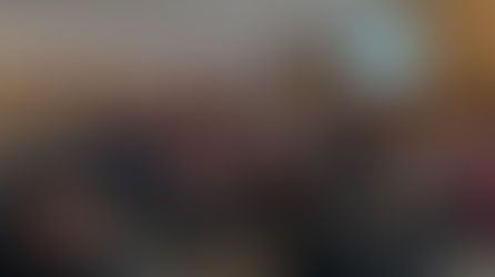 SCTTA speaks to a seated audience inside Wayne County meeting room, with a projected slide titled “Partner Benefits” displayed at the front of the room.