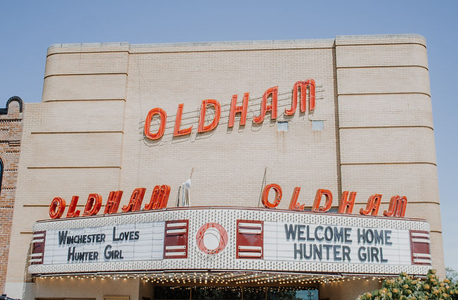 Oldham Theatre Marquee reading: WELCOME HOME HUNTERGIRL