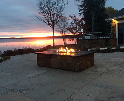 fire pit with seating wall and patio Mid Michigan