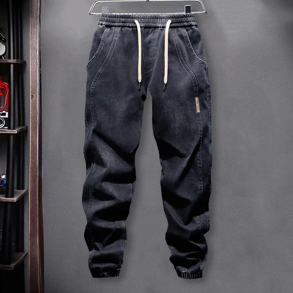 Miniatura: Pantalon avec liens aux jambes, poches et taille élastique.