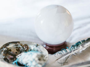 crystal ball and abalone shell with sage
