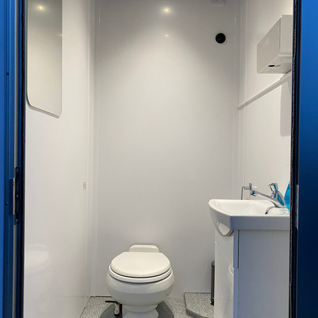 Bright clean cubicle in the drivable honey wagon