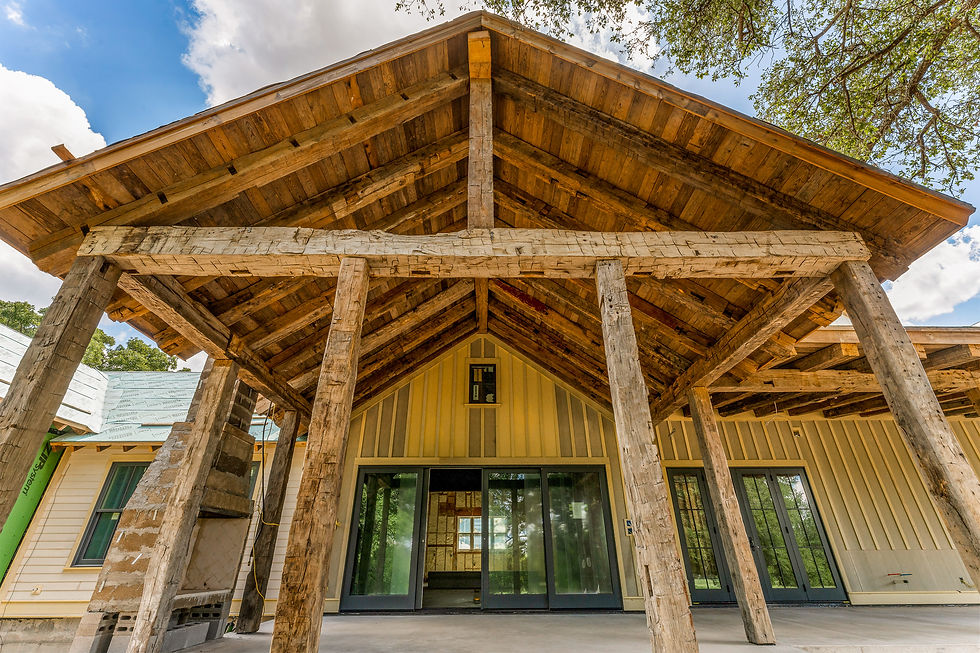 outdoor vaulted ceiling with exposed beams and reclaimed lumber.jpg