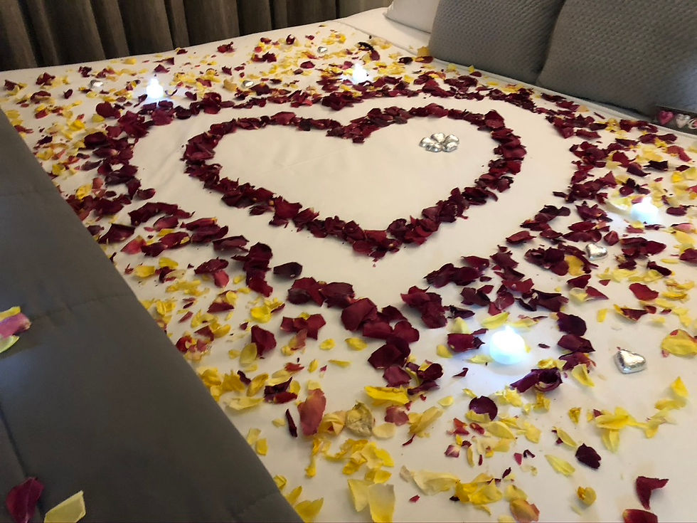 Thumbnail: Ultimate Rose Petal Package with Champagne, Candlelights and Balloons
