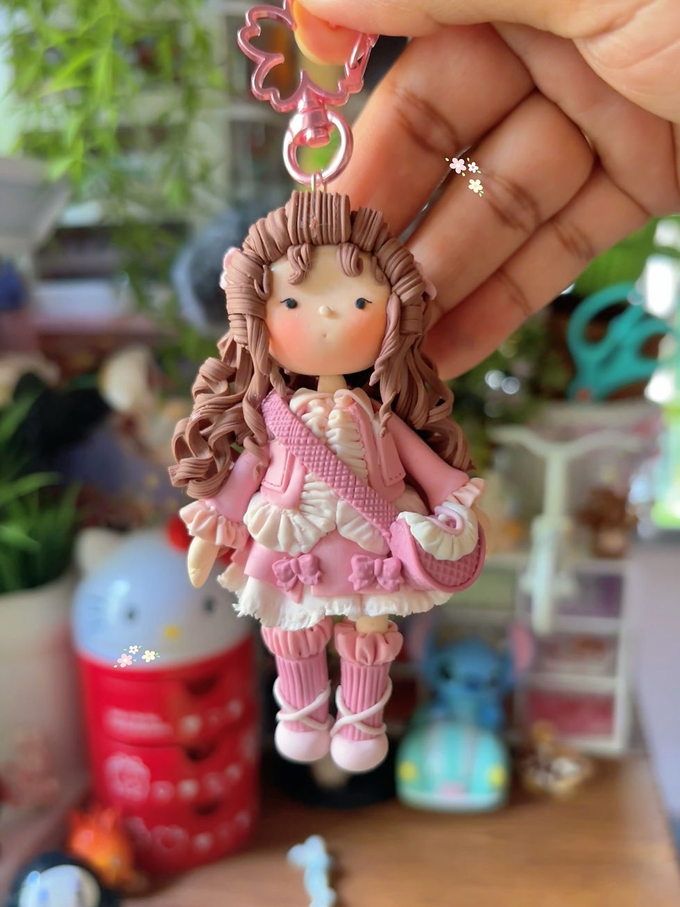 handmade doll keychain with curly hair and side bag charm - Front View