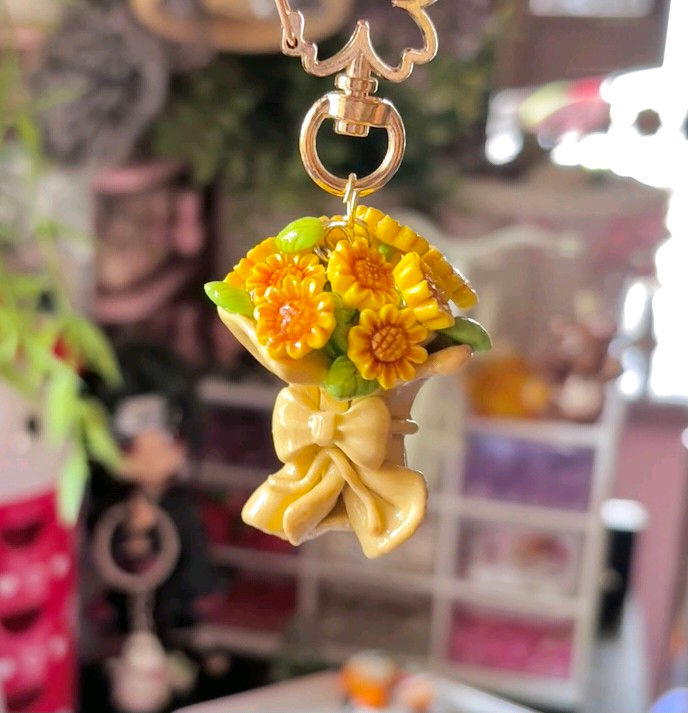 sunflower bouquet keychain handmade clay flowers wrapped with ribbon bow charm - Hanging View