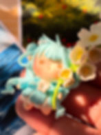 Thumbnail: umihana ocean fairy keychain handmade clay pixie with blue hair and white flowers - Close Up View
