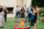 Guests enjoying portable mini golf during an outdoor wedding reception in Texas.