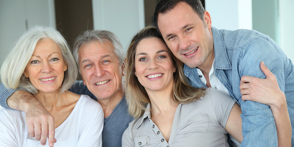 partner and spouse smiling