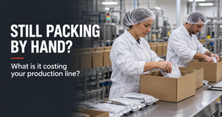 Two factory workers manually packing food pouches into cartons, illustrating manual end-of-line packing.